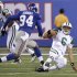 New York Jets quarterback Mark Sanchez, right, slides to avoid a tackle by New York Giants' Mathias Kiwanuka (94) during the first quarter of an NFL preseason football game Monday, Aug. 29, 2011, in East Rutherford, N.J. (AP Photo/Julio Cortez)
