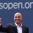 Two-time U.S. Open champion Agassi waves before being inducted into the U.S. Open Court of Champions in New York