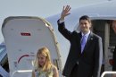 Republican vice presidential candidate Paul Ryan and his wife Janna arrive at Huntsville International Airport to attend a fund raising event in Huntsville, Ala Friday morning Oct. 26, 2012. (AP Photo/The Huntsville Times, Bob Gathany)