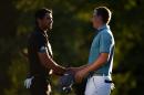 Jason Day and Jordan Spieth shake hands on the 18th green during round two of the Deutsche Bank Championship at TPC Boston on September 5, 2015 in Norton, Massachuetts