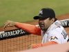 Florida Marlins' manager Ozzie Guillen is seen in the dugout during their MLB National League baseball game against the Chicago Cubs at Marlins Stadium in Miami