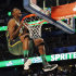 Utah Jazz's Jeremy Evans hangs onto the rim after his attempt during the NBA basketball All-Star Slam Dunk Contest in Orlando, Fla., Saturday, Feb. 25, 2012. Evans earned 29 percent of 3 million text message votes cast by fans to win the competition. (AP Photo/Lynne Sladky)