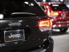 Jeep vehicles are seen on display during a press preview at the 2013 New York International Auto Show in New York