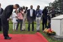 United Nations Secretary General Ban Ki-moon prays after laying a wreath to commemorate the fourth anniversary of a deadly attack on the global body by Boko Haram militants, in Abuja, on August 24, 2015