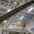A wing and main body section of the first Airbus A350 is seen on the final assembly line in Toulouse