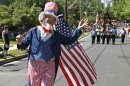 Silverstone, dressed as "Uncle Sam," marches in the Takoma Park Independence Day parade during celebrations of the United States' Fourth of July Independence Day holiday in Takoma Park, Maryland