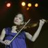 A file photograph shows violinist Vanessa Mae performing on stage during a concert in Prague