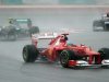 Fernando Alonso says Ferrari still have their work cut out to stay competitive despite victory in wet Malaysia