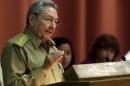 Cuba's President Raul Castro delivers his speech at the closing of the second day of a twice-annual legislative sessions, at the National Assembly in Havana, Cuba, Saturday, Dec. 21, 2013. Castro issued a stern warning to entrepreneurs pushing the boundaries of Cuba's economic reform, saying 