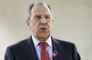 Russian Foreign Minister Sergey Lavrov delivers his speech during the opening of a high-level segment of the 25th session of the Human Rights Council, at the European headquarters of the United Nations, in Geneva, Switzerland, Monday, March 3, 2014. Lavrov said Russian troops that have streamed into Ukraine are protecting his country's citizens living there. He said that it's necessary to use Russian troops in Ukraine "until the normalization of the political situation." (AP Photo/Keystone, Salvatore Di Nolfi)