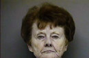 This booking photo provided by the Montgomery County, Texas, District Attorney, shows Dorothy Canfield, 84. Montgomery County District Attorney Brett Ligon on Monday April 15, 2013, said Canfield of Willis, Texas, sought to have him attacked and Assistant District Attorney Rob Fryer slain. (AP Photo/Montgomery County District Attorney)