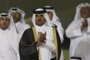 Qatar's Crown Prince Sheikh Tamim bin Hamad al-Thani arrives at Al-Sadd Stadium for the final Crown Prince Cup soccer match between Al-Sadd and Lekhwaiya in Doha
