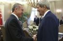 U.S. Secretary of State John Kerry and Turkey's President Tayyip Erdogan talk at the beginning of a meeting in Ankara