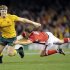 Australia's Pocock breaks the tackle of Priestland of Wales during their international rugby test match in Melbourne