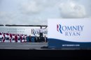 Republican presidential candidate, former Massachusetts Gov. Mitt Romney waves as he arrives for a campaign stop, Friday, Aug. 31, 2012, in Lakeland, Fla. (AP Photo/Evan Vucci)