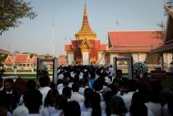 Thousands of Cambodians enter the crematorium where former king Norodom Sihanouk's cremation is being held in Phnom Penh on February 4, 2013. Mourners dressed in black and white gathered Monday ahead of the cremation of Sihanouk, who steered Cambodia through six turbulent decades