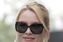 FILE - In this March 15, 2012 file photo, Nicollette Sheridan arrives at court in Los Angeles. A judge declared a mistrial Monday in Nicollette Sheridan's wrongful termination trial after the jury deadlocked, leaving an unresolved finale to a two-week trial that focused on the behind-the-scenes intrigue and personalities of TV's 