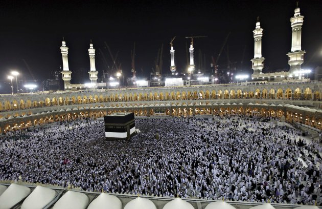 Muslim pilgrims circle the …