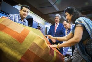 US Secretary of State John Kerry looks at carpets during&nbsp;&hellip;