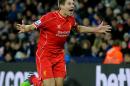 Liverpool's Steven Gerrard celebrates after scoring against Leicester during the English Premier League soccer match between Leicester City and Liverpool at King Power Stadium, in Leicester, England, Tuesday, Dec. 2, 2014. (AP Photo/Rui Vieira)