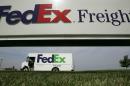 File - This June 21, 2005 file photo shows a Federal Express delivery truck leaving a FedEx distribution terminal in Edwardsville, Kan. FedEx Corp. is under criminal indictment and facing $1.6 billion in penalties for allegedly failing to police the activities of illegal online pharmacies that use the shipping service to deliver prescription drugs. (AP Photo/Charlie Riedel, File)