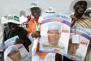 Supporters dance with posters of Nigerian Vice President&nbsp;&hellip;