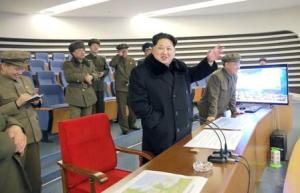 North Korean leader Kim Jong Un (C) reacts as he watches&nbsp;&hellip;