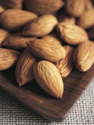A handful of almonds a day will keep the bloat away. Err, is that how it goes?