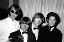 FILE - This June 4, 1967 file photo shows The Monkees posing with their Emmy award at the 19th Annual Primetime Emmy Awards in Calif. The group members are, from left to right, Mike Nesmith, Davy Jones, Peter Tork, and Micky Dolenz. Jones died Wednesday Feb. 29, 2012 in Florida. He was 66. Jones rose to fame in 1965 when he joined The Monkees, a British popular rock group formed for a television show. Jones sang lead vocals on songs like 