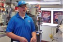 In this screen grab provided by WCCO TV is Dairy Queen employee Joey Prusak in Hopkins, Minn. Prusak is winning praise for his treatment of a visually impaired customer who unwittingly dropped a $20 bill on the floor. After another customer pocketed the bill, Prusak asked her to return it, and when she didn't, told her to leave the store. He then gave the visually impaired customer $20 from his own wallet. (AP Photo/Courtesy WCCO TV)