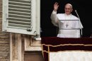 Pope Francis gives his first Angelus Blessing to the faithful from the window of his private residence on March 17 in Vatican City. 