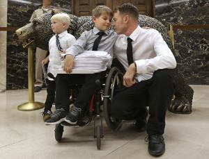 Otto Coleman, 6, waits outside the Governor&#39;s office&nbsp;&hellip;