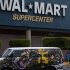 A van covered by a mural sits parked outside a Walt-Mart Super Center in Mexico City, Saturday, April 21, 2012.  Wal-Mart Stores Inc. hushed up a vast bribery campaign that top executives of its Mexican subsidiary carried out to build stores across Mexico, according to a published report by the New York Times. Wal-Mart is Mexico's largest private employer. (AP Photo/Dieu Nalio Chery)