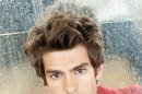 FILE - In this July 22, 2011 file photo, actor Andrew Garfield poses for a portrait at Comic Con in San Diego, Calif. Garfield, who will star in the reboot of the 