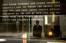 Barack Obama and Elie Wiesel are reflected in a wall in the Hall of Remembrance at the US Holocaust Memorial Museum