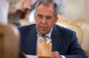 Russian Foreign Minister Sergei Lavrov listens to his Saudi counterpart during a meeting in Moscow on August 11, 2015