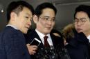 Jay Y. Lee, vice chairman of Samsung Electronics, arrives to be questioned in Seoul
