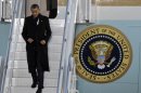 U.S. President Barack Obama arrives to attend the Nuclear Security Summit at Osan Air Base in Osan, south of Seoul, South Korea, Sunday, March 25, 2012. (AP Photo/Lee Jin-man)