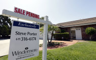 FILE - In this Wednesday, Aug. 14, 2013, file photo, a home is for sale in San Diego. Private data provider CoreLogic reports on home prices for August on Tuesday, Oct. 1, 2013. (AP Photo/Gregory Bull, File)
