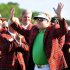 Carl Pettersson, of Sweden, waves to the crowd after putting on the tartan jacket on 18th fairway during the final round of the RBC Heritage golf tournament in Hilton Head Island, S.C., Sunday, April 15, 2012. Pettersson finished 14-under par. (AP Photo/Stephen Morton)