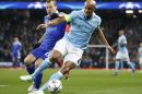 Manchester City's Vincent Kompany, right, shields the ball form Kiev's Oleh Husev during the Champions League round of 16 second leg soccer match between Manchester City and Dynamo Kiev at the Etihad Stadium, Manchester, England, Tuesday, March. 15, 2016. (AP Photo/Jon Super)