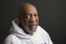FILE - In this Nov. 18, 2013 file photo, actor-comedian Bill Cosby poses for a portrait in New York. Los Angeles County prosecutors have declined to charge Cosby with sexually abusing two teenagers in 1965 and 2008, citing time limits and a lack of evidence. The decision on Wednesday, Jan. 6, 2016, comes about a week after the 78-year-old comedian was charged with drugging and sexually assaulting a woman in 2004 inside his home near Philadelphia. (Photo by Victoria Will/Invision/AP, File)