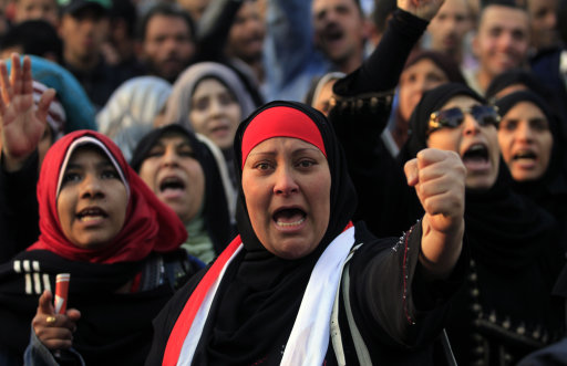 Protesters chant slogans at a rally honoring those killed in clashes with security forces in Tahrir Square in Cairo, Egypt, Friday, Jan. 20, 2012, nearly a year after the 18-day uprising that ousted President Hosni Mubarak. Activists are now trying to energize the public to demand that the ruling military step down. (AP Photo/Khalil Hamra)
