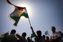 Supporters of the Kurdistan Workers Party (PKK) demonstrate outside the UN office in Arbil on September 20, 2014