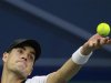 John Isner of the U.S. serves to South Africa's Kevin Anderson during the men's singles match at the Shanghai Masters tennis tournament in Shanghai
