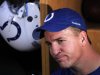 In this Dec. 2, 2011 file photo, Indianapolis Colts quarterback Peyton Manning talks to reporters in the locker room at the NFL football team's practice facility in Indianapolis. (AP Photo/Michael Conroy, File)