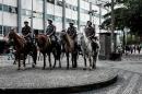 Mounted police officers patrol Rio de Janeiro's downtown where insecurity is increasing, on May 5, 2015