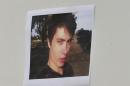 A picture of Elliot Rodger is displayed during a news conference by Santa Barbara County Sheriff Bill Brown at Sheriff headquarters in Santa Barbara