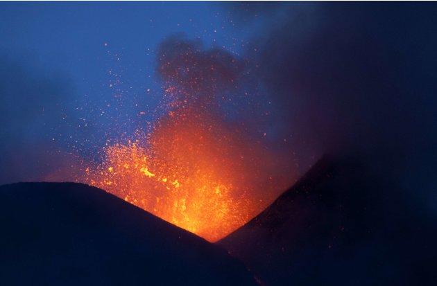 Italy's volcanic Mount Etna spews lava during an eruption on the southern Italian island of Sicily