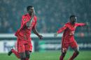 FC Midtjylland's Nigerian forward Paul Onuachu celebrates scoring their second goal during the UEFA Europa League Round of 32 football match between Manchester United and FC Midtjylland in Hernin on February 18, 2016